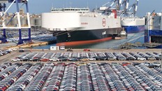 Electric vehicles waiting to be loaded on the BYD Explorer No.1, a domestically manufactured vessel that exports Chinese automobiles. CREDIT: Getty