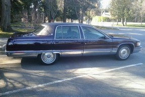 Brian’s Dark Cherry Metallic 1996 Cadillac Fleetwood has been driven 99,000 kilometres,
