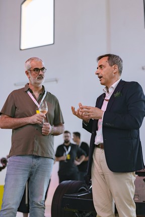 Michele Pignatti Morano, Director of the Ferrari Museums (right), speaks alongside Julien Hummer, Ubisoft Ivory Tower Creative Director, at the Enzo Ferrari Museum in Modena, in June 2025