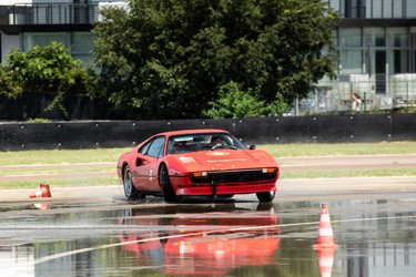 A Ferrari 308 being hooned around Circuit Fiorano as part of Ferrari's Corso Pilota program