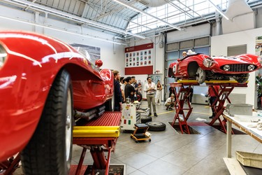 Vintage Ferraris undergoing maintenance at the Ferrari Classiche restoration department