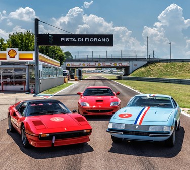 A Ferrari 365 GTB/4 Daytona (right), a 550 Maranello (center), and a 308 (left)