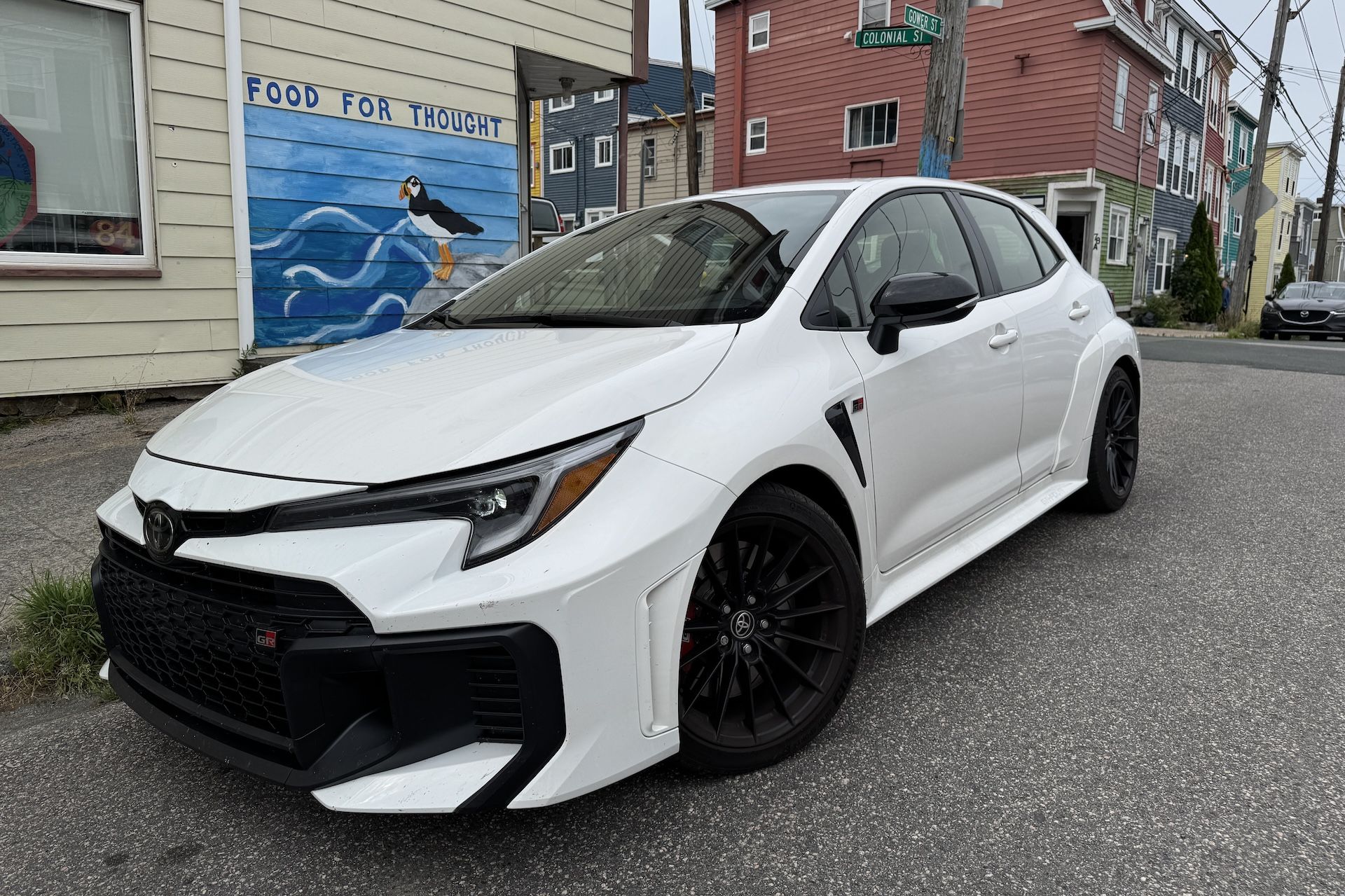 2025 Toyota GR Corolla in front of local Newfoundland art