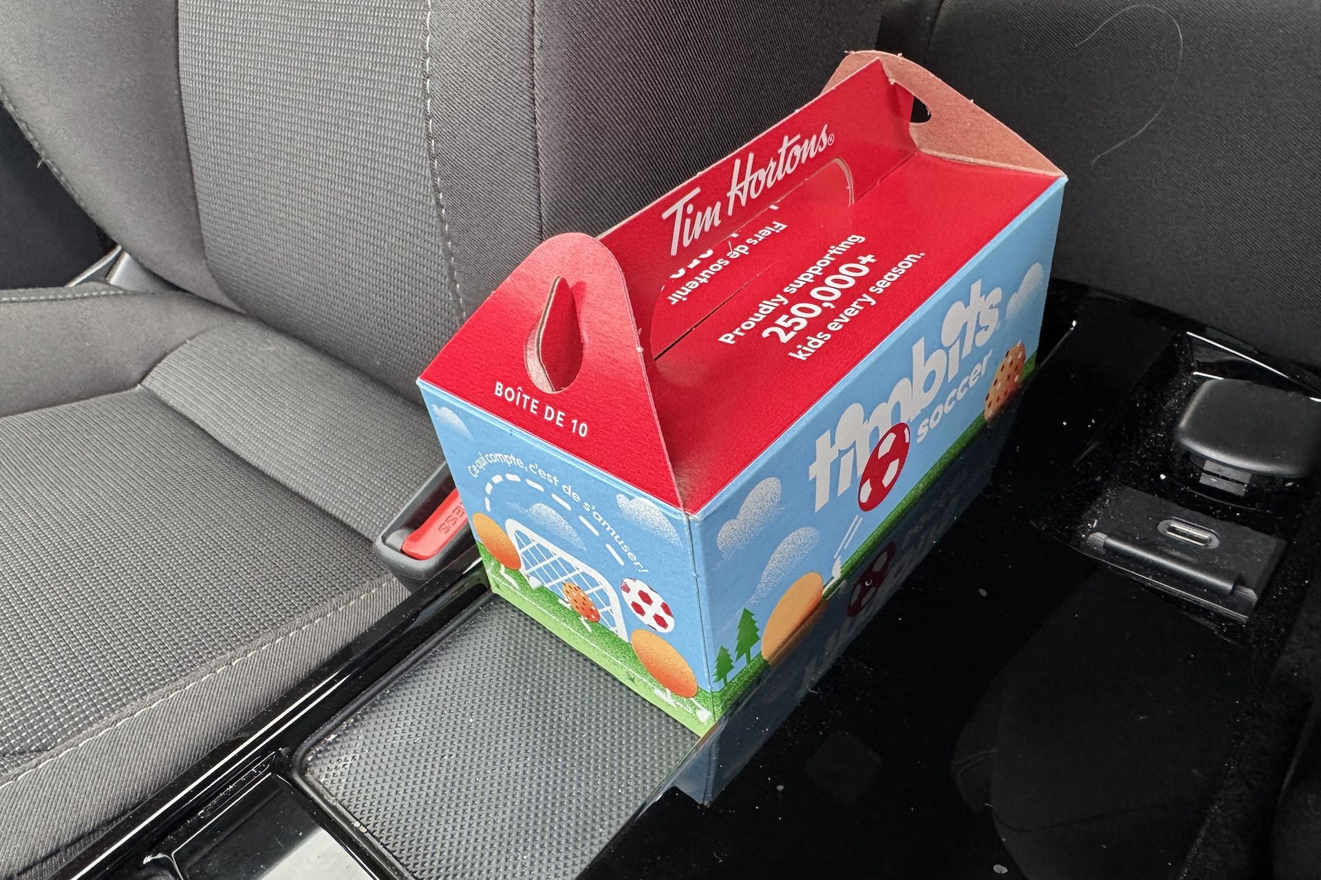 Box of ten Timbits in a 2025 Toyota GR Corolla