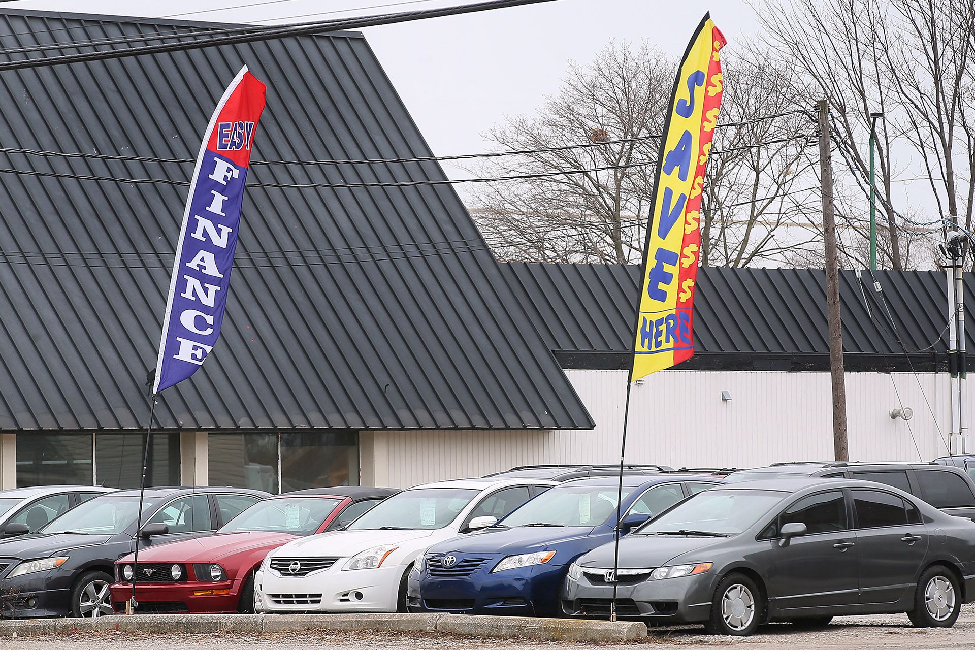 Used vehicles at a pre-owned car dealership in Windsor, Ontario on Tuesday, March 4, 2025