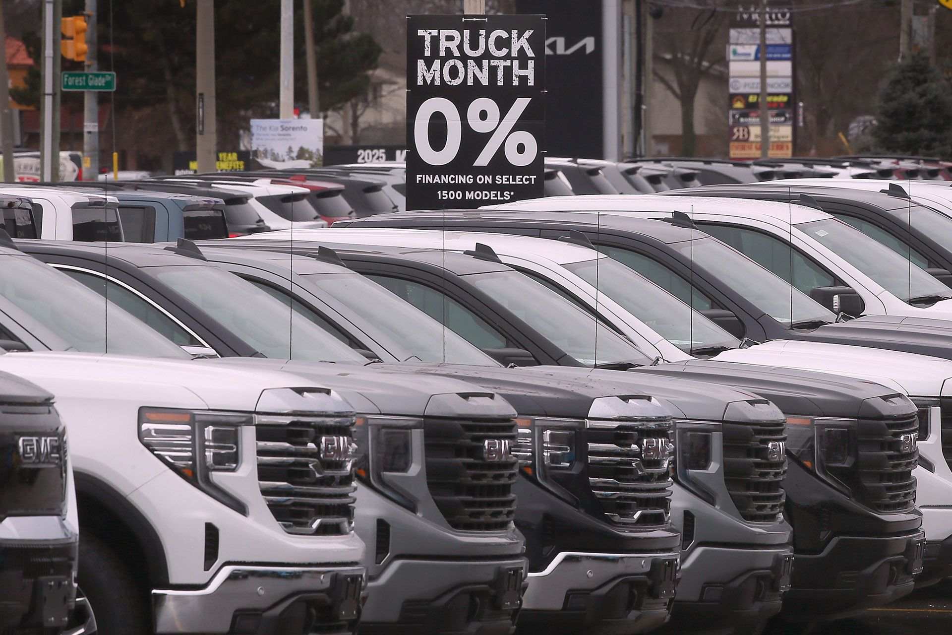 GMC pickup trucks at a Windsor, Ontario car dealership on Tuesday, March 4, 2025