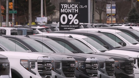 GMC pickup trucks at a Windsor, Ontario car dealership on Tuesday, March 4, 2025