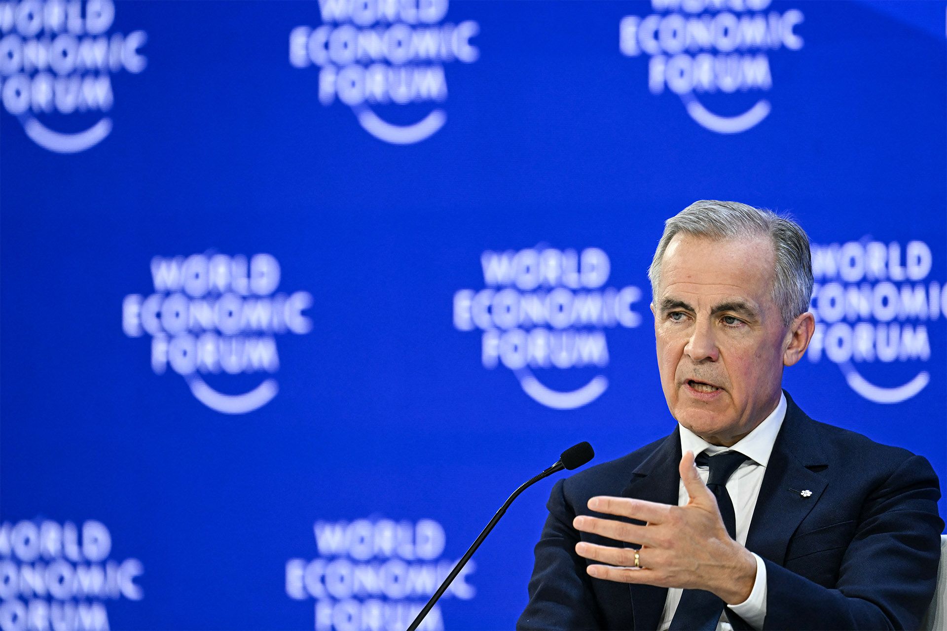 Canada's Prime Minister Mark Carney gestures as he speaks during the World Economic Forum (WEF) annual meeting in Davos on January 20, 2026