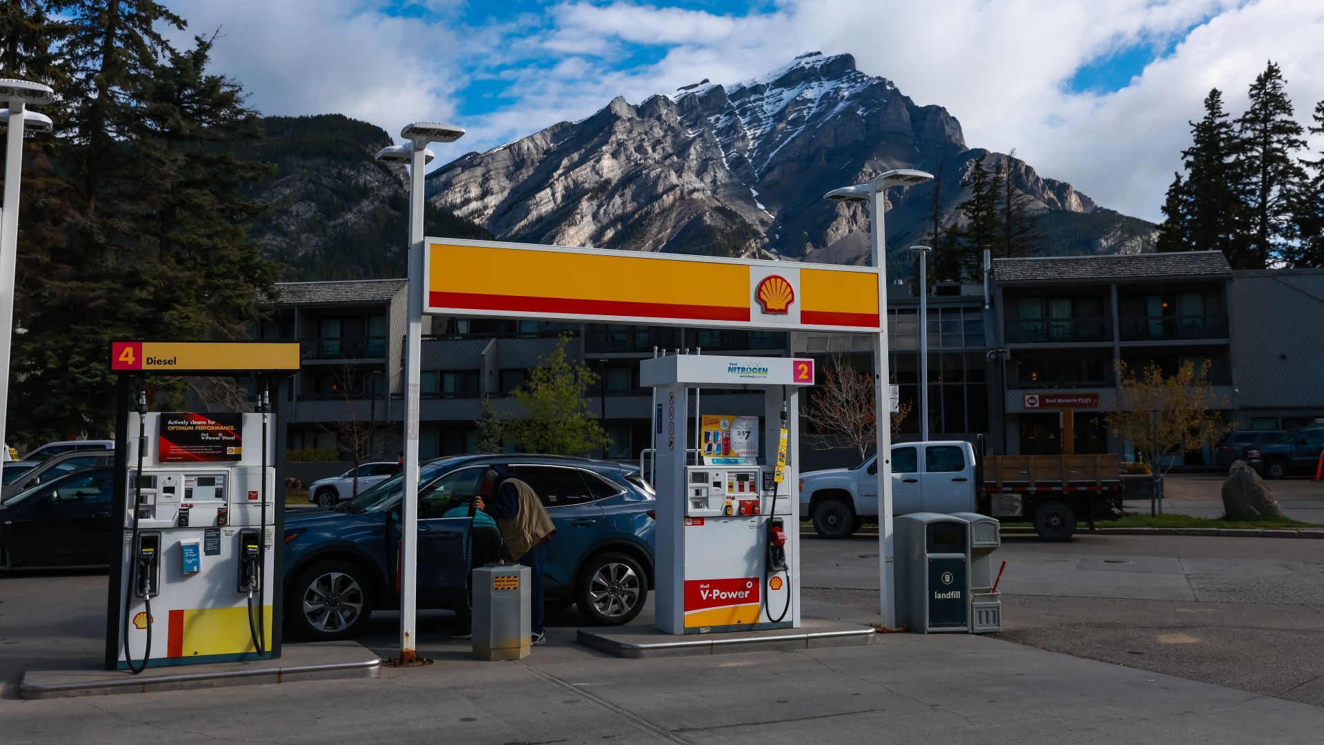A car stops for gas a Shell gas station in Banff, Alberta, Canada