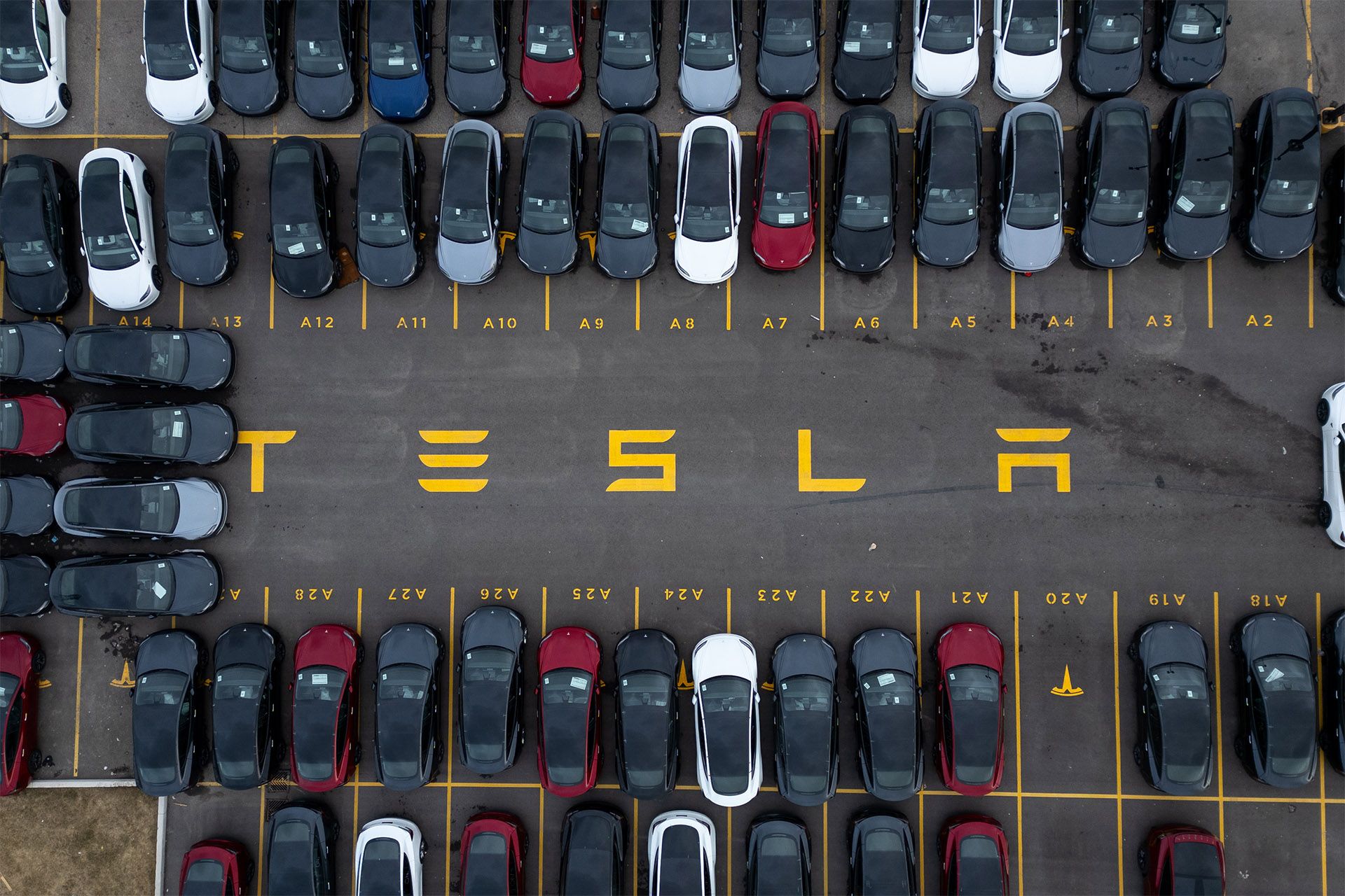An aerial view of a Tesla dealership on March 20, 2025 in Hamilton, Canada