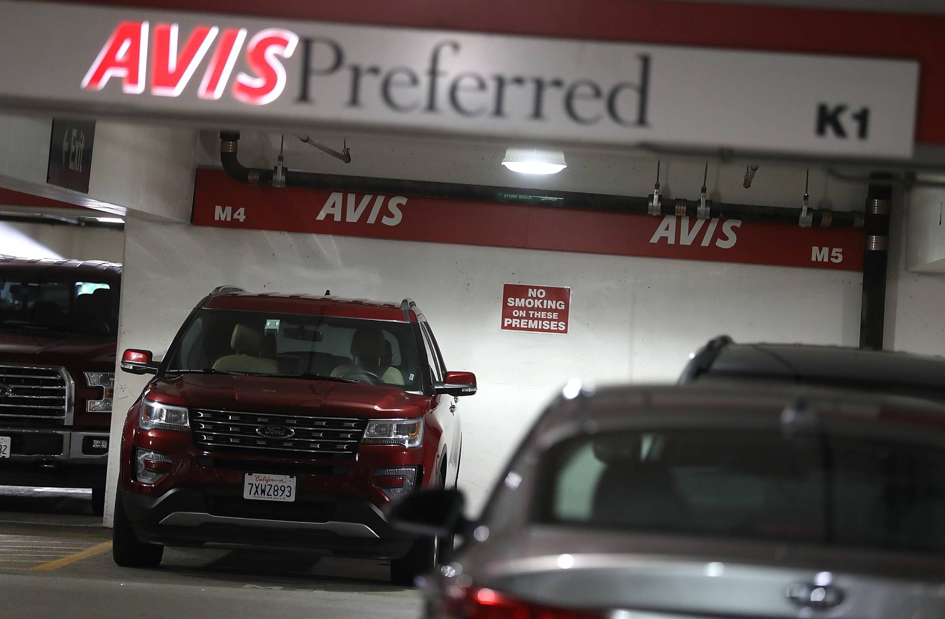 Cars are parked at an Avis rental car office on August 8, 2017 in San Francisco, California