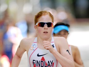 Edmonton's Paula Findlay en route to winning the Dextro Energy World Championship Series ITU Triathlon in Madrid. Photo: Delly Carr / ITU