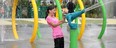 Kids play at the Jackie Parker Park water feature in Mill Woods. Photo by Chris Schwarz / Edmonton Journal.