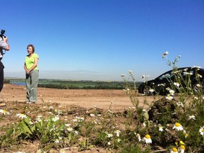 Coun. Linda Sloan with photographer Bruce Edwards in the land now under development near Big Lake. Photo by Elise Stolte / Edmonton Journal