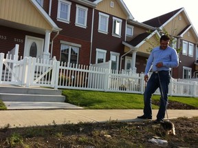 Steven Dollansky outside his new townhouse in Terwillegar Towne. Photo by Elise Stolte / Edmonton Journal