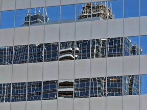 EDMONTON ALBERTA APRIL 13, 2011 -The new Epcor Tower reflects in another downtown building in Edmonton Ab on Wednesday Apr.13, 2011.( Photo by John Lucas/Edmonton Journal)