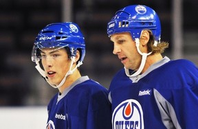 Down two defencemen, the Edmonton Oilers dress Ryan Whitney and Theo  Peckham