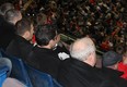 A group of St. Louis Blues scouts look on during Friday's round roubin affair between the Czech Republic and Team USA (Photo by Farhan Devji).