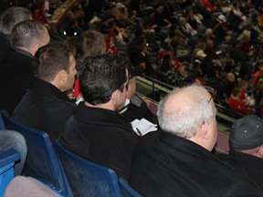A group of St. Louis Blues scouts look on during Friday's round roubin affair between the Czech Republic and Team USA (Photo by Farhan Devji).