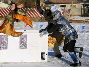 Mark Henderson and Randall Fraser push Caley Suliak in a practise run for the "Cool Runnin's Deep Freezer Races" in a deep freeze behind the Alberta Avenue Community Centre in Edmonton on Tuesday Dec 13, 2011. The Freezer Races will be part of the 5th annual Deep Freeze: Byzantine Winter Festival on Jan 7 & 8, 2012. Photo by John Lucas/Edmonton Journal