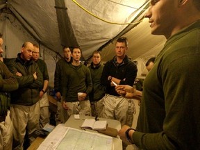 Screen capture from a 360-degree panorama of soldiers receiving orders in the mess tent. Panorama by Ryan Jackson