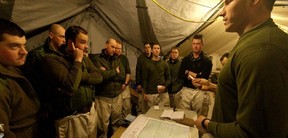 Screen capture from a 360-degree panorama of soldiers receiving orders in the mess tent. Panorama by Ryan Jackson