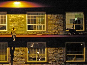 One of my first experiences in east downtown or The Quarters was as a crime reporter standing outside this rooming house. Police tried to coax a man back over the body of the man he killed to arrest him. Photo by Shaughn Butts / Edmonton Journal