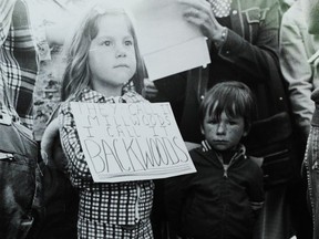 Child protests the lack of schools in Mill Woods in 1975. Photo from the provincial archives, J.2029/2