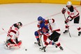 From left to right, Martin Brodeur (age 40), Marek Zidlicky (35) and Bryce Salvador (36) have been #s 1, 2, & 3 in ice time for the New Jersey Devils in the playoffs, charged with the responsibility of shutting down the likes of Brad Richards. In other news, Lou Lamoriello is a sorcerer.