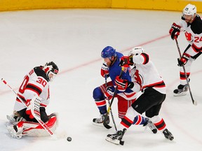 From left to right, Martin Brodeur (age 40), Marek Zidlicky (35) and Bryce Salvador (36) have been #s 1, 2, & 3 in ice time for the New Jersey Devils in the playoffs, charged with the responsibility of shutting down the likes of Brad Richards. In other news, Lou Lamoriello is a sorcerer.