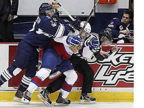 All three teams -- the Shawinigan Cataractes, the Edmonton Oil Kings, and the game officials -- had some shaky moments in the opening game of the 2012 Memorial Cup. The Oil Kings prevailed, 4-3.