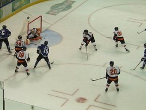 Medicine Hat Tigers goalie Tyler Bunz slams the door against Victoria Royals in a 4-2 win last October.