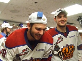 Mitch Moroz (left) shares a special moment with Edmonton Journal writer Cam Tait in the aftermath of the Oil Kings' capturing the Ed Chynoweth Cup in 2012.