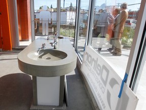 The glass walls of the new public toilets on Whyte Avenue. Photo by Rick MacWilliam, Edmonton Journal