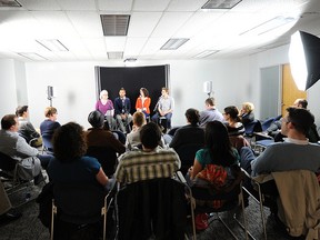 The first Capital Ideas event, featuring Raoul Mendoza, Lisa Hagen and Everett Kunitz, moderated by me, watched by members of our community. Photo by Candace Elliott