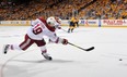 NASHVILLE, TN - MAY 04:  Shane Doan #19 of the Phoenix Coyotes takes a slapshot against the Nashville Predators in Game Four of the Western Conference Semifinals during the 2012 NHL Stanley Cup Playoffs at the Bridgestone Arena on May 2, 2012 in Nashville, Tennessee.  (Photo by Frederick Breedon/Getty Images)