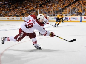 NASHVILLE, TN - MAY 04:  Shane Doan #19 of the Phoenix Coyotes takes a slapshot against the Nashville Predators in Game Four of the Western Conference Semifinals during the 2012 NHL Stanley Cup Playoffs at the Bridgestone Arena on May 2, 2012 in Nashville, Tennessee.  (Photo by Frederick Breedon/Getty Images)