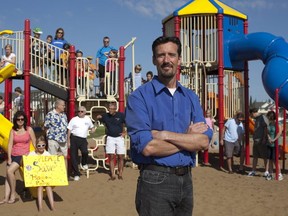 Community league president David Faber with his supporters at the playground in Haddow Park. Photo by Jason Franson/Edmonton Journal