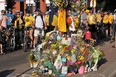 Cyclists gathered around a memorial for Isaak Kornelsen. Photo by Shaughn Butts/Edmonton Journal