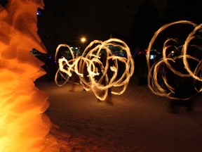 The Vibe Tribe performed with flaming torches on chains during the Winter Light portion of the Silver Skate Festival in Hawrelak Park on Saturday February 21/2009. (John Lucas/Edmonton Journal)