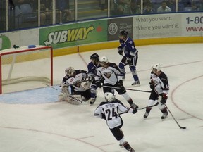 David Musil (wearing the "A") was a central figure in Vancouver Giants' defensive zone all night long. (All photos: Bruce McCurdy)