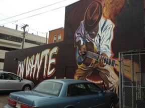 A new mural on the side of the Commercial Hotel on Whyte Avenue. Photo by Elise Stolte