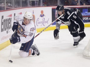 Ryan Nugent-Hopkins displays a little magic setting up a goal from an awkward position against San Antonio Rampage earlier this season. (Photo: Steven Christy/OKC Barons)