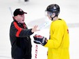 Spott the Nuge: Coach Steve Spott talks to his captain, Ryan Nugent-Hopkins, at a Team Canada practice. Hey Coach! This gives me a good idea for a penalty killer!