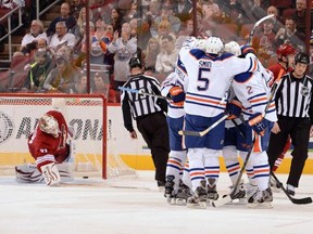 Edmonton Oilers celebrate Lennart Petrell's first period goal against Phoenix (Norm Hall/Getty Images)
