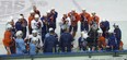 Ralph Krueger (front and centre, with bald spot) has the complete attention of his team. (Photo: Bruce McCurdy)