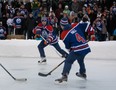 EDMONTON ALTA.: JANUARY 13, 2013--Edmonton Oilers Ryan Smyth passes the puck to Taylor Hall during a game of shinny for fans on a rink at Hawrelak Park on January 13, 2013 in Edmonton. Greg Southam/Edmonton Journal