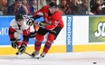 Tobias Rieder wins a puck battle with Jonathan Huberdeau at the 2011 Top Prospects Game.