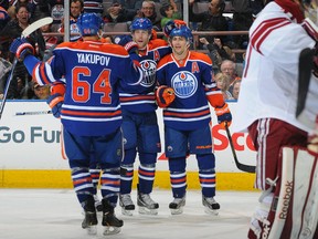 Oilers players celebrate Jordan Eberle's second-period goal against Phoenix. (PHoto: Andy Devlin/Getty Images)