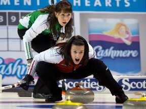 Team Canada skip Heather Nedohin calls a shot as Saskatchewan skip Jill Shumay looks over her shoulder during draw twelve curling action at the Scotties Tournament of Hearts Feb. 21, 2013 in Kingston, Ont. Shumay came from behind 5-1 after four ends to win 7-5.